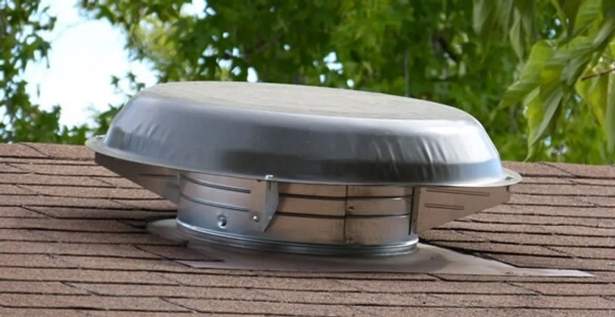 attic fan installation services with low-profile roof ventilation unit in Chico, CA