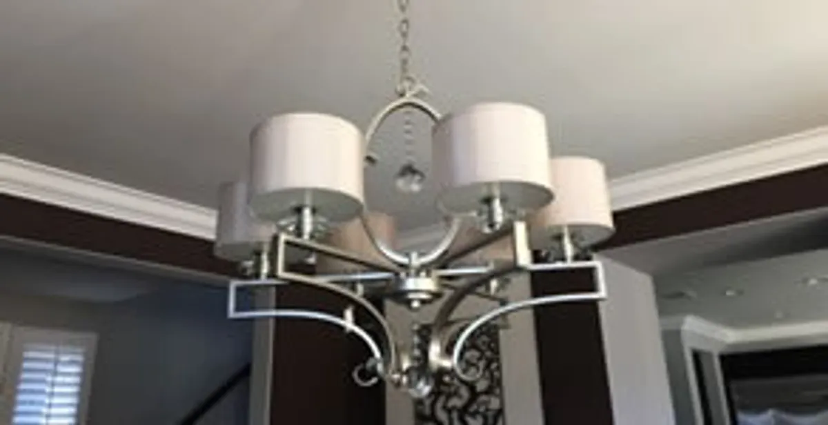 Modern chandelier installation with multiple light fixtures in Chico, CA